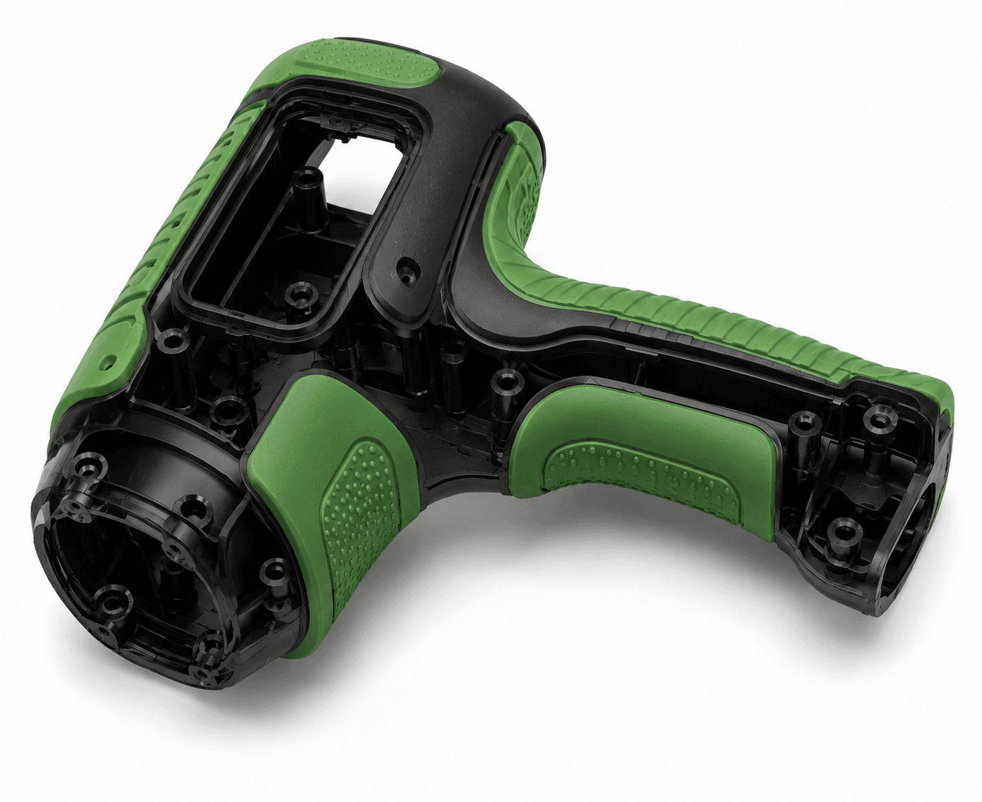 Black power tool housing with green overmolded grip panels